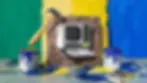 funny hammer nailing computer to wood; web design