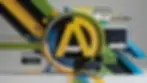 a large 3d letter A, abstract shapes in green, yellow, and blue.